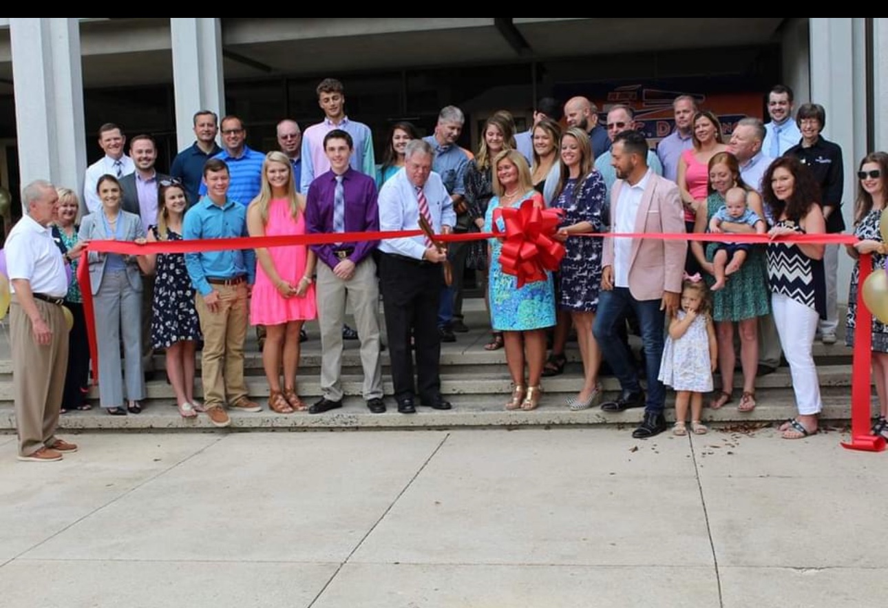 Steve C. Davis, Inc. ribbon-cutting ceremony with company team members, family, and community guests